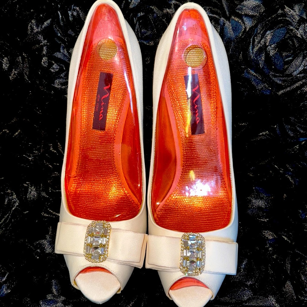 "Nina's Ivory Peep-Toe Luster Satin Heel